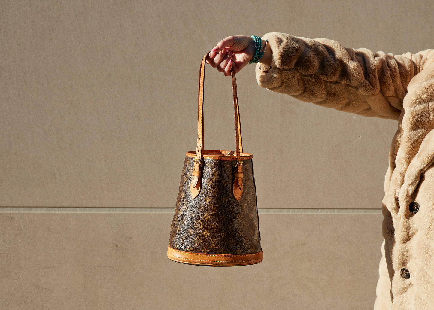 Authentic Louis Vuitton Monogram Petit Bucket With Pouch